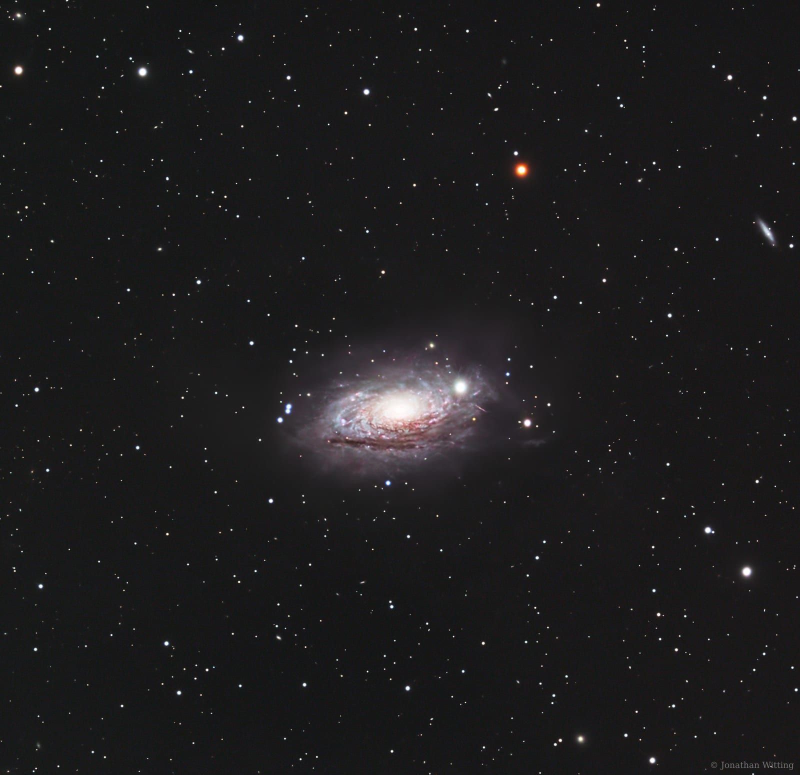 M63, the Sunflower Galaxy, a flocculent spiral in Canes Venatici.